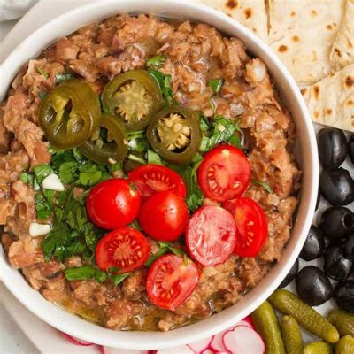  Ful Medames: Ein cremiges Hülsenfrüchtegericht mit pikanten Aromen für einen unvergesslichen Morgen!